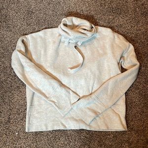 Slightly cropped style sweater. Size small